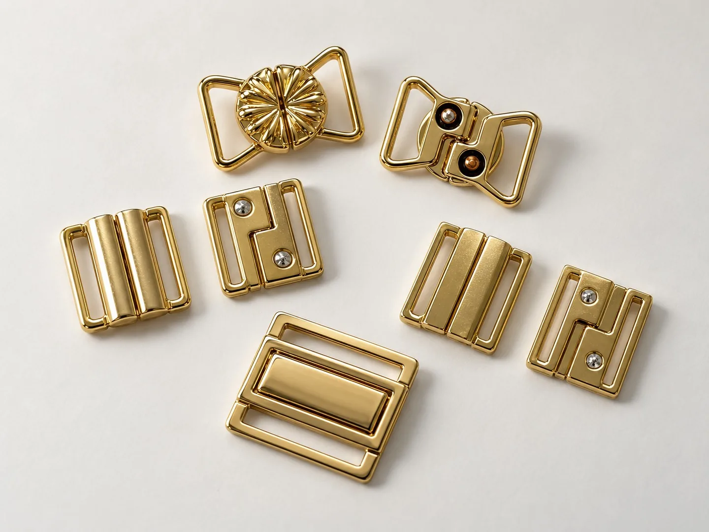Lingerie and swimwear clasps and closures