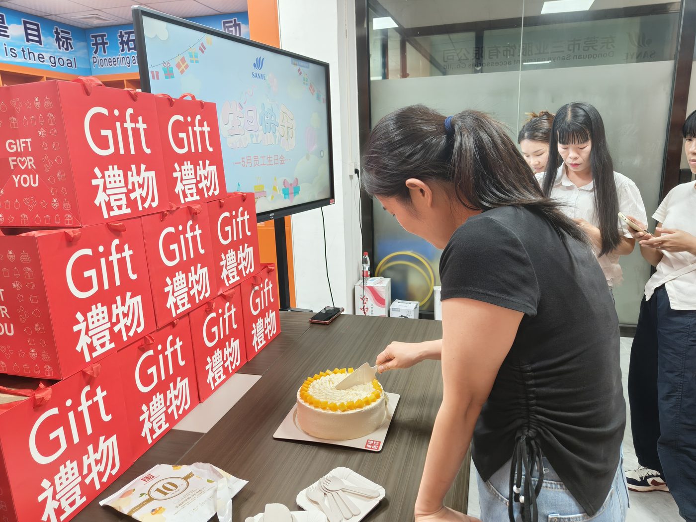 Birthday cake and employee gifts at SANYE