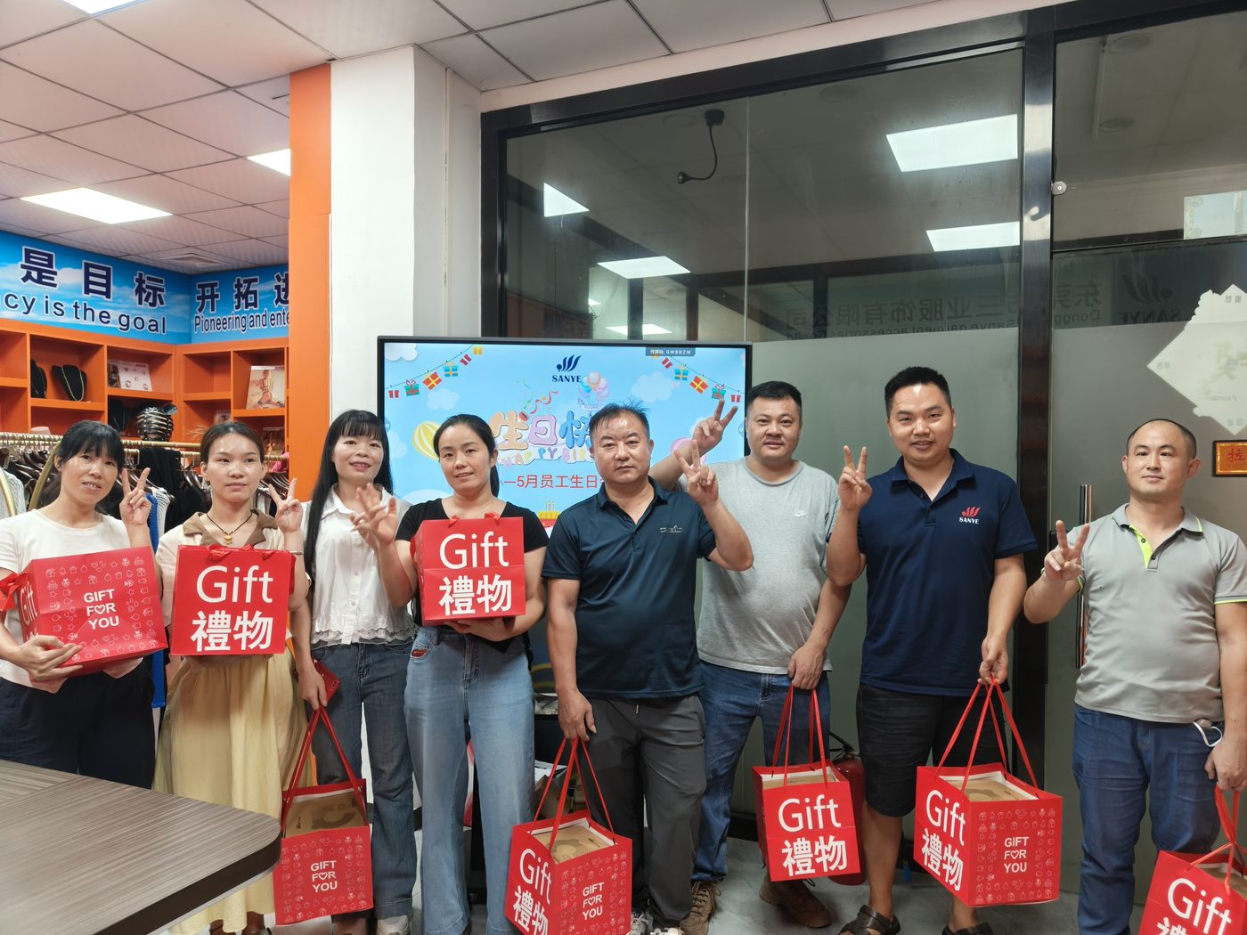 September birthday employees receiving gifts at SANYE